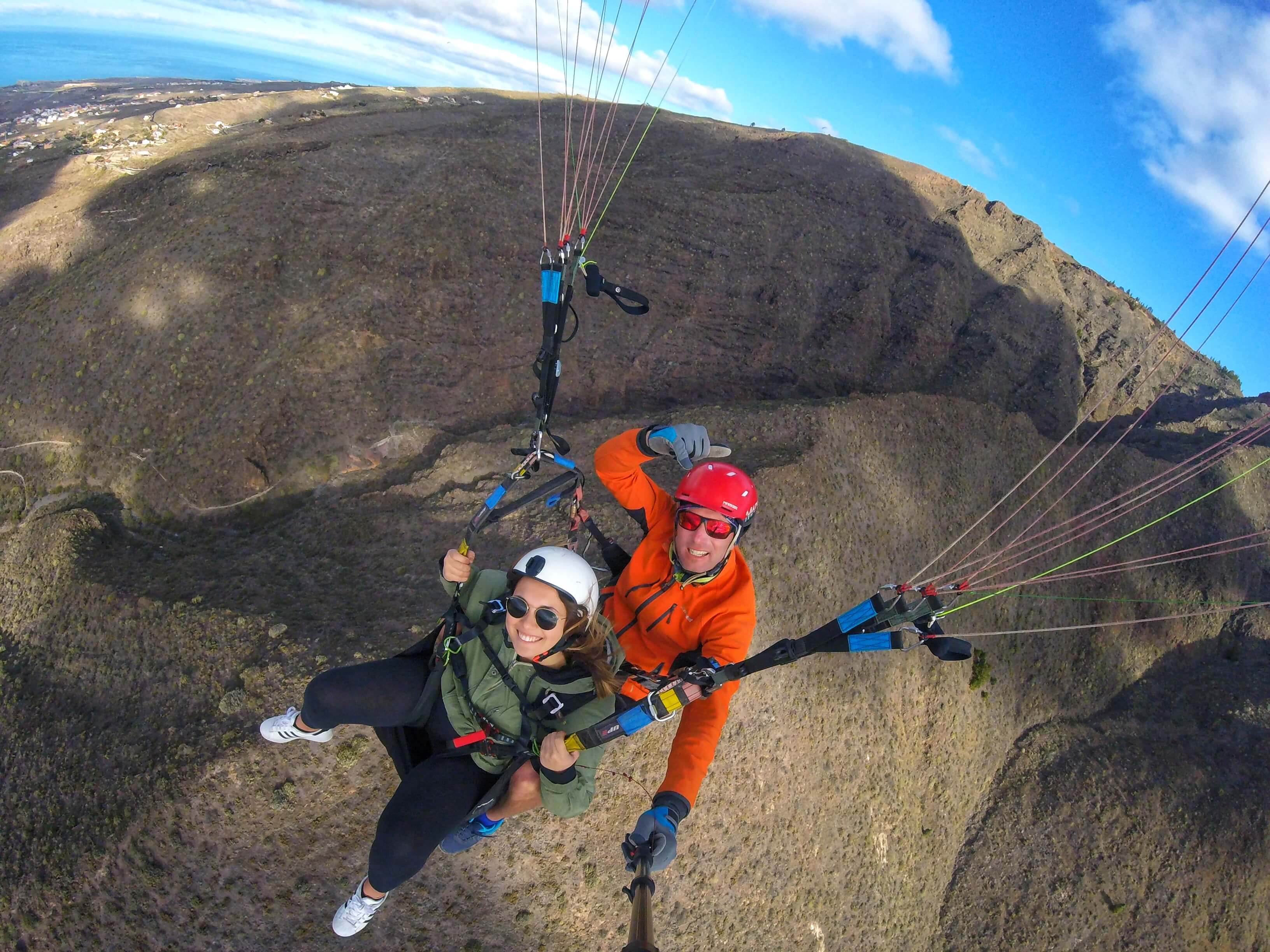 flying in paragliding with professional pilot in tenerife